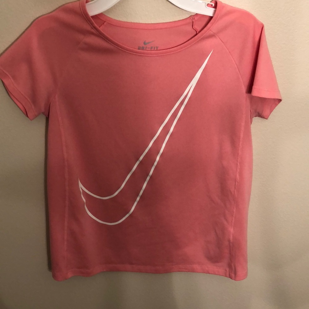 Girls peach Nike shirt